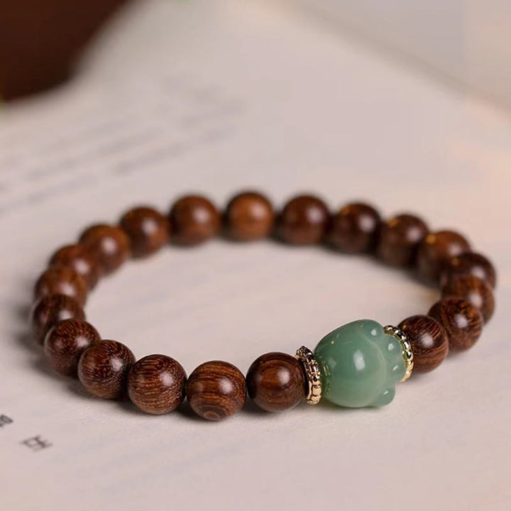 Bracelet de protection pour pattes de chat en bois de santal et Buddha Stones - Santal - image 1