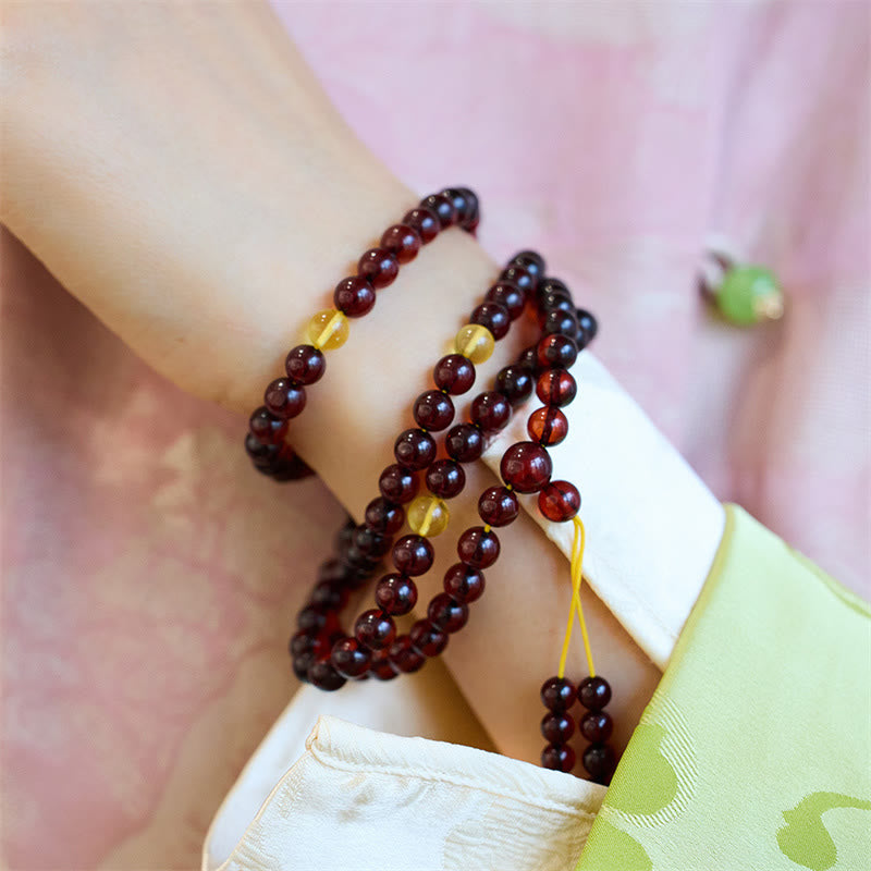 Bracelet Mala en Buddha Stones avec 108 perles d'ambre transparentes contre l'anxiété