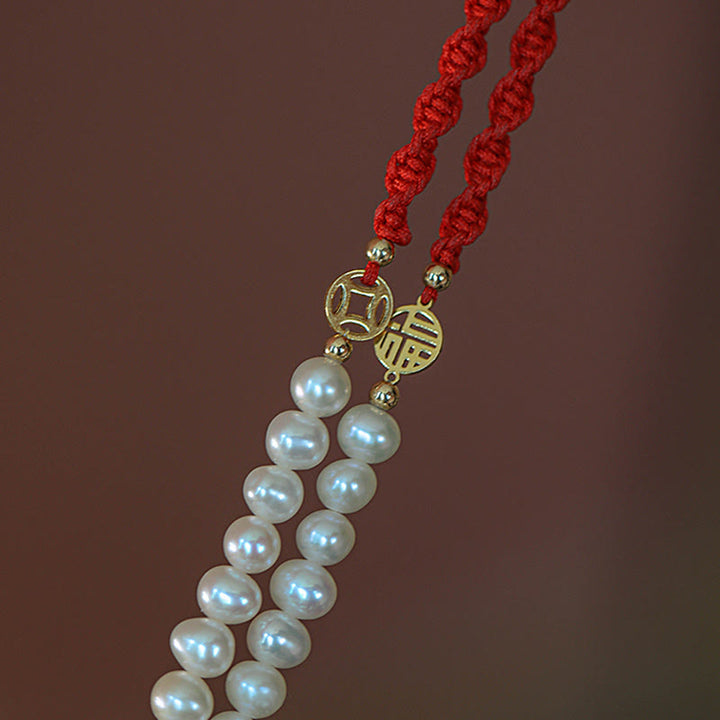 Bracelet tressé en fil rouge avec perles de protection et de chance plaquées or 14 carats