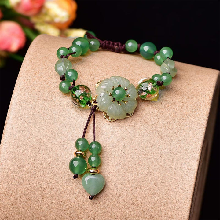 Bracelet porte-bonheur en jade vert naturel Buddha Stones et fleur pendante