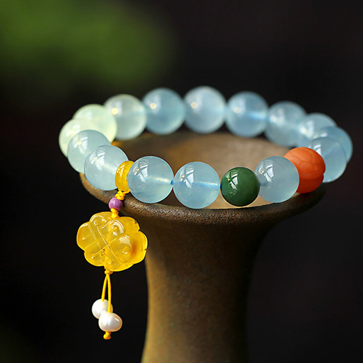 Bracelet de paix avec breloque en ambre et aigue-marine naturelle