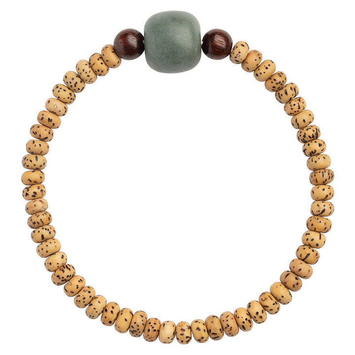 Bracelet de sagesse en bois de santal rouge à petites feuilles et Buddha Stones