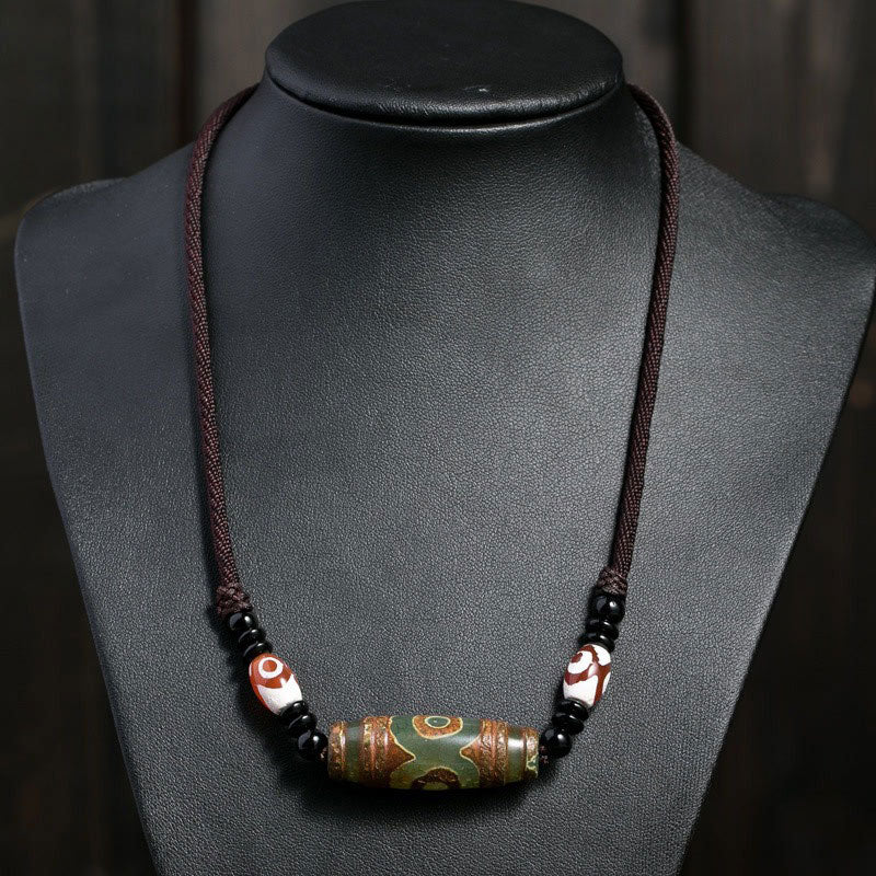 Collier de protection en perles tibétaines à neuf yeux Dzi Buddha Stones