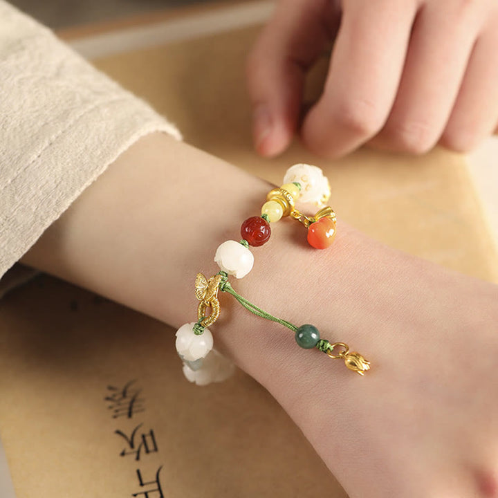 Bracelet d'harmonie et de paix en perles de citrouille et de lotus en Buddha Stones naturelles