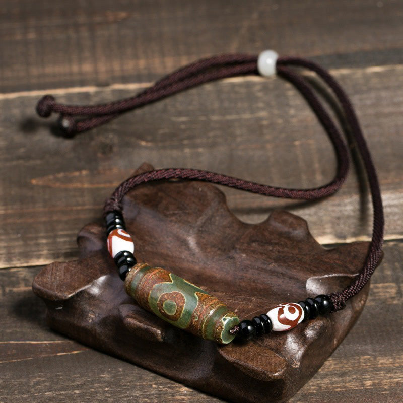 Collier de protection en perles tibétaines à neuf yeux Dzi Buddha Stones