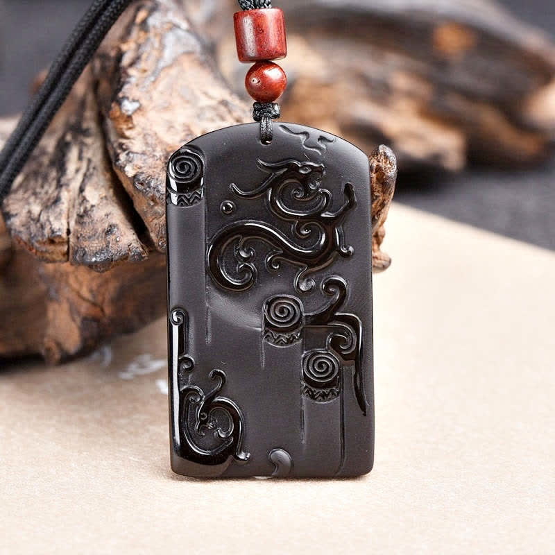 Collier avec pendentif dragon et phénix en obsidienne noire - image 2