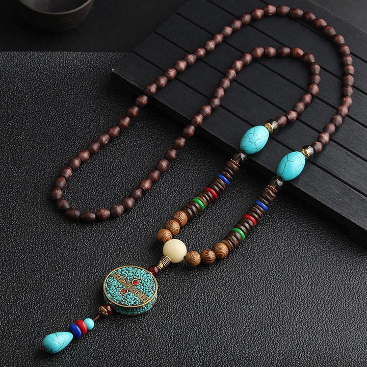 Collier de méditation en bois de wengé Buddha Stones en turquoise et perles Dzi