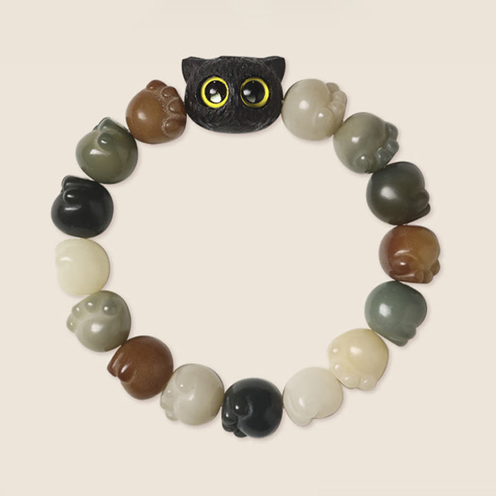 Bracelet de sagesse porte-bonheur en bois d'ébène avec de belles pattes et des graines de Bodhi naturelles de Buddha Stones - image 4