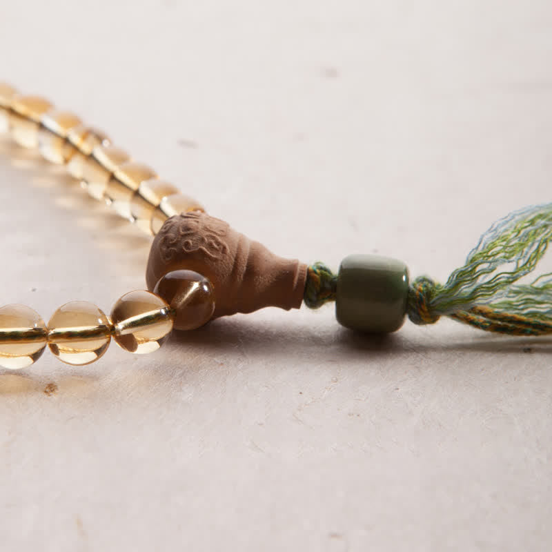 Bracelet Mala 108 Buddha Stones, citrine, bois de santal, turquoise, protection et prospérité