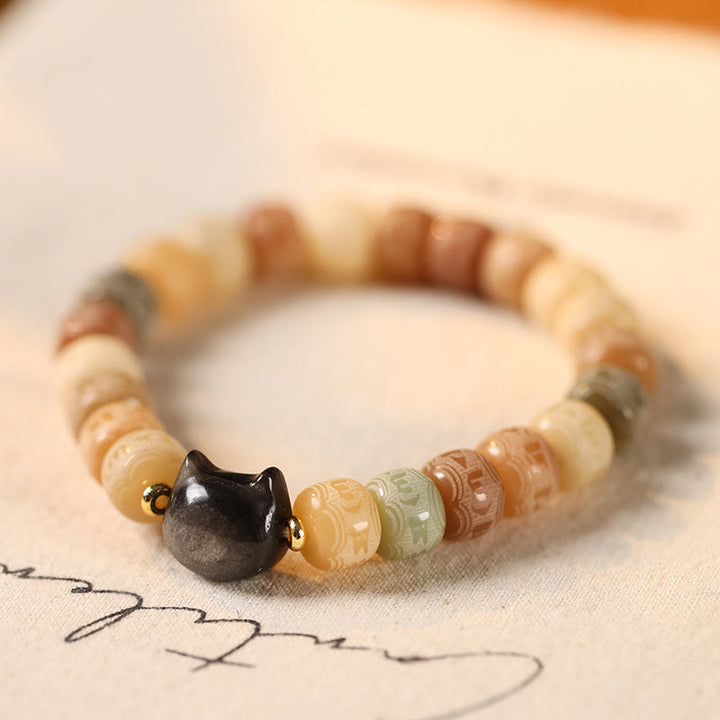 Bracelet d'harmonie gravé en obsidienne argentée Buddha Stones de Bodhi et pierres de Bouddha Tête de chat Om Mani Padme Hum - Graine de Bodhi jaune (circonférence du poignet 14-16 cm) - image 1