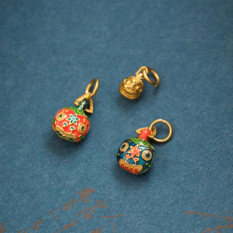 Porte-clés porte-bonheur de la famille des bêtes avaleuses d'or