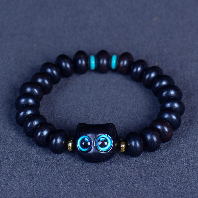 Bracelet Buddha Stones Bois d'ébène Verre Liuli Joli Chat Paix Équilibre - Perles en ébène 7 x 10 mm x 21 (tour de poignet 14-16 cm) - image 1