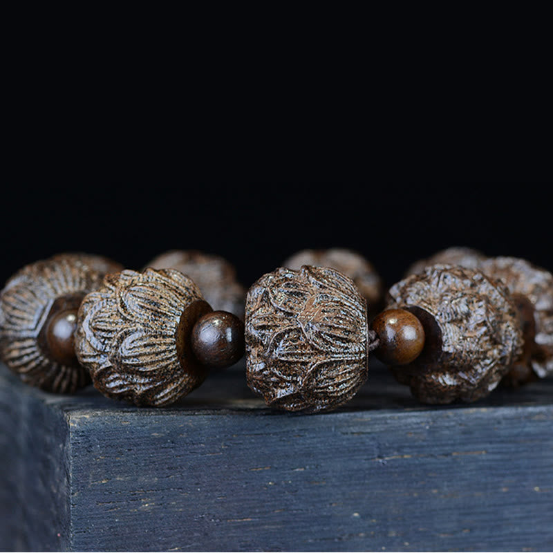 Bracelet d'équilibre gravé en bois d'ébène avec Buddha Stones et dragon de lotus des dix-huit arhats