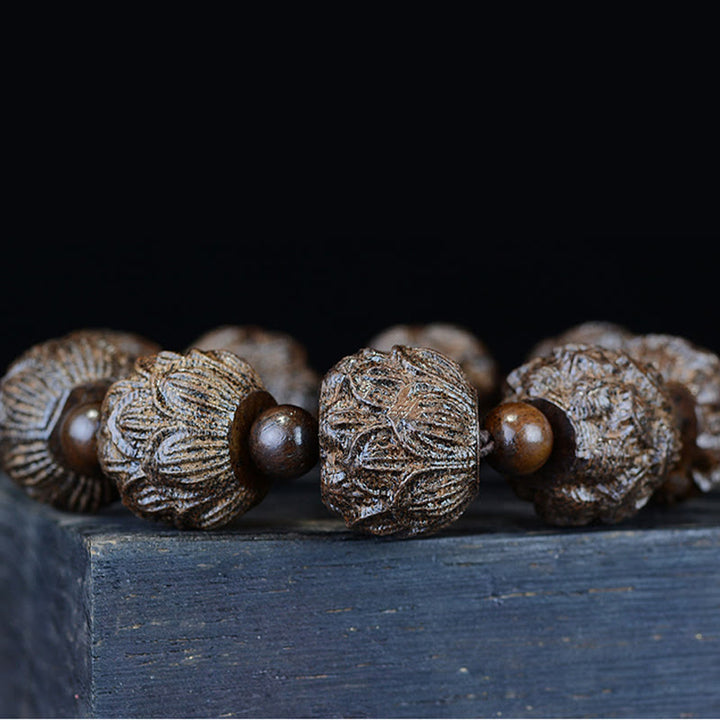 Bracelet d'équilibre gravé en bois d'ébène avec Buddha Stones et dragon de lotus des dix-huit arhats