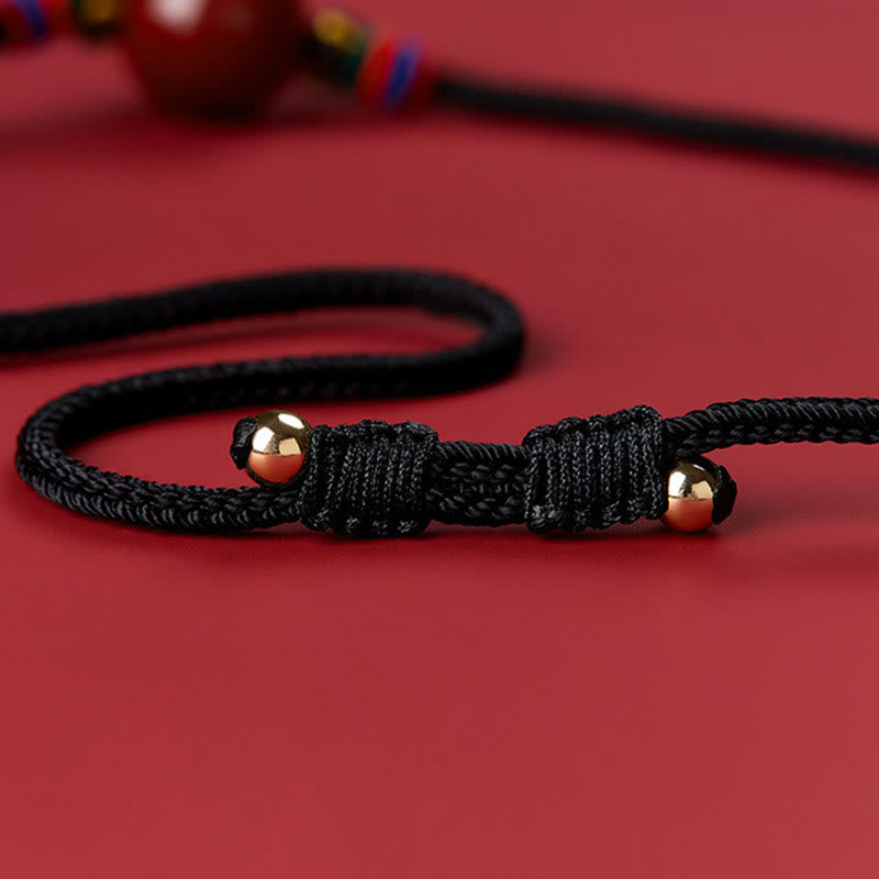 Collier avec pendentif en perles de cinabre et Buddha Stones