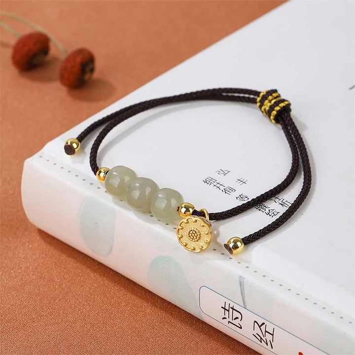 Bracelet tressé fait main en Buddha Stones de jade Hetian et gousse de lotus pour la prospérité et la chance