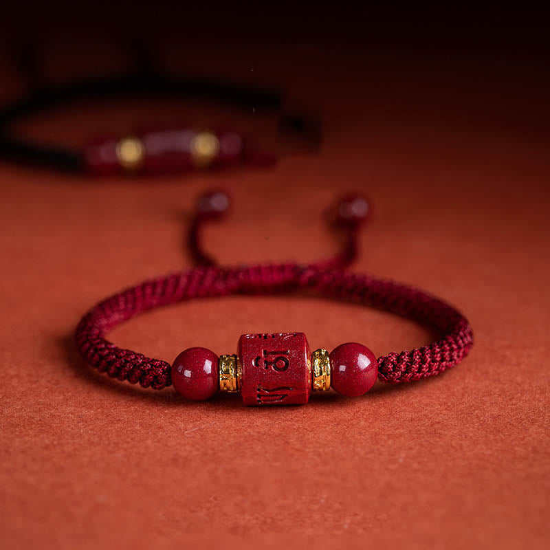 Bracelet tressé avec Buddha Stones tibétaines en cinabre Om Mani Padme Hum gravé et bénédiction