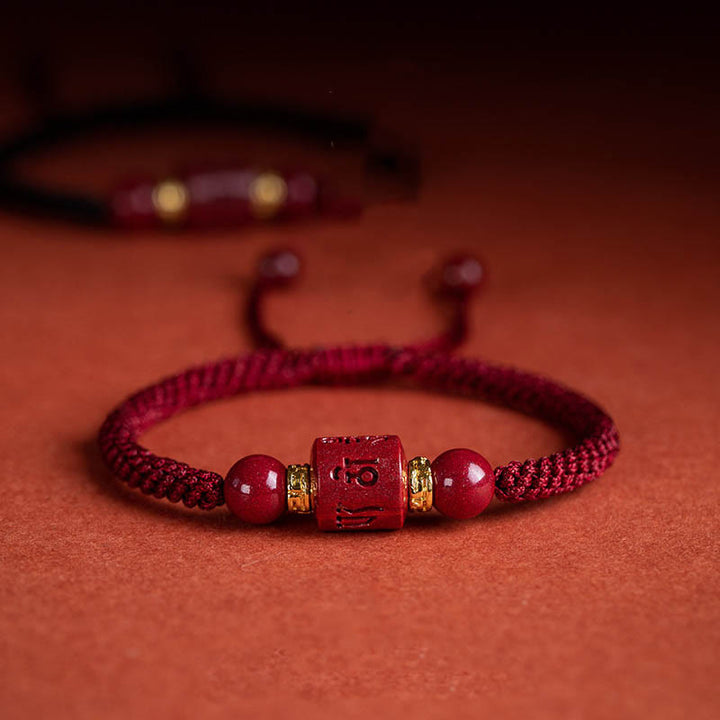 Bracelet tressé avec Buddha Stones tibétaines en cinabre Om Mani Padme Hum gravé et bénédiction