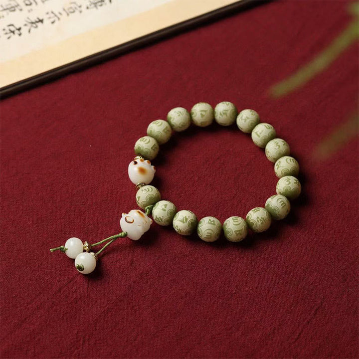 Bracelet de sagesse gravé en forme de patte de chat avec graines de Bodhi vertes et pierres de Buddha Stones Om Mani Padme Hum - Graine de Bodhi (Auspiciosité ♥ Chance) - image 1