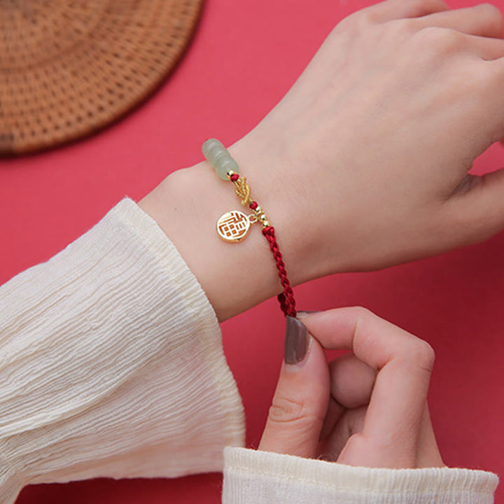 Bracelet porte-bonheur en corde rouge avec perles de jade fabriquées à la main par Buddha Stones