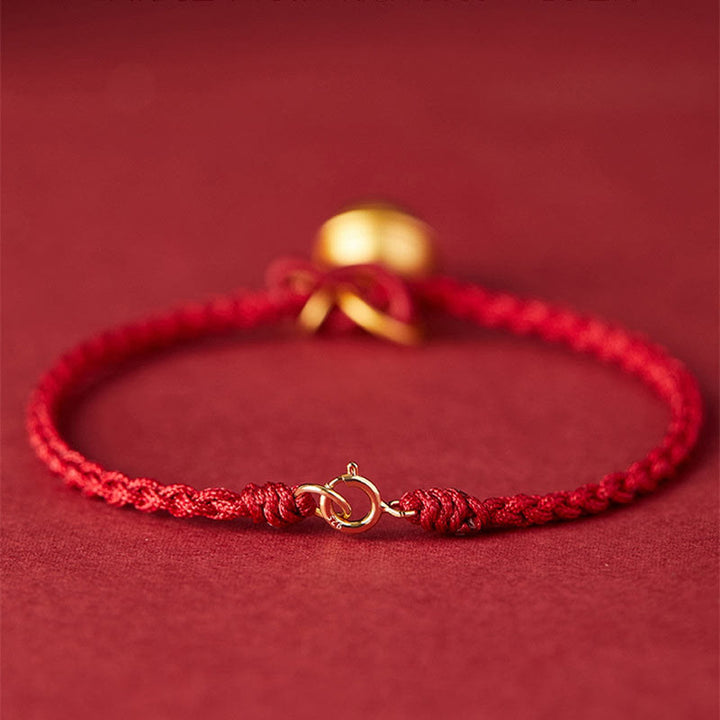 Bracelet en corde rouge avec breloque en forme de personnage Fu fait à la main en Buddha Stones