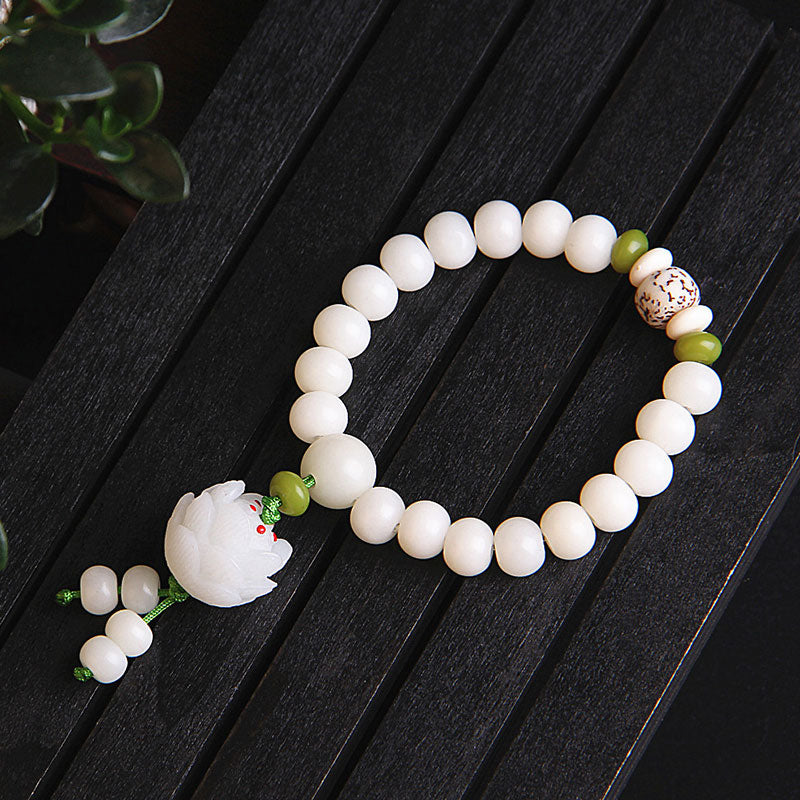 Bracelet porte-bonheur en Buddha Stones et lotus blanc naturel