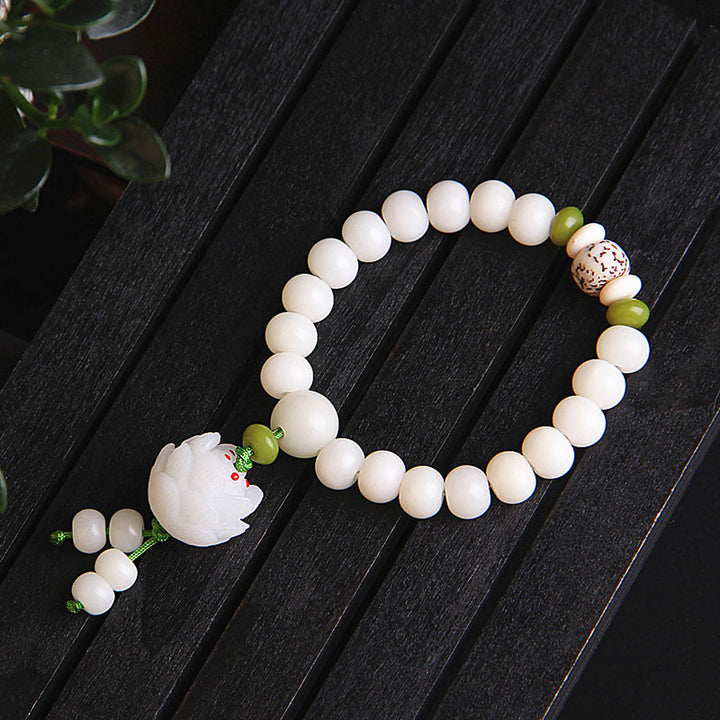 Bracelet porte-bonheur en Buddha Stones et lotus blanc naturel