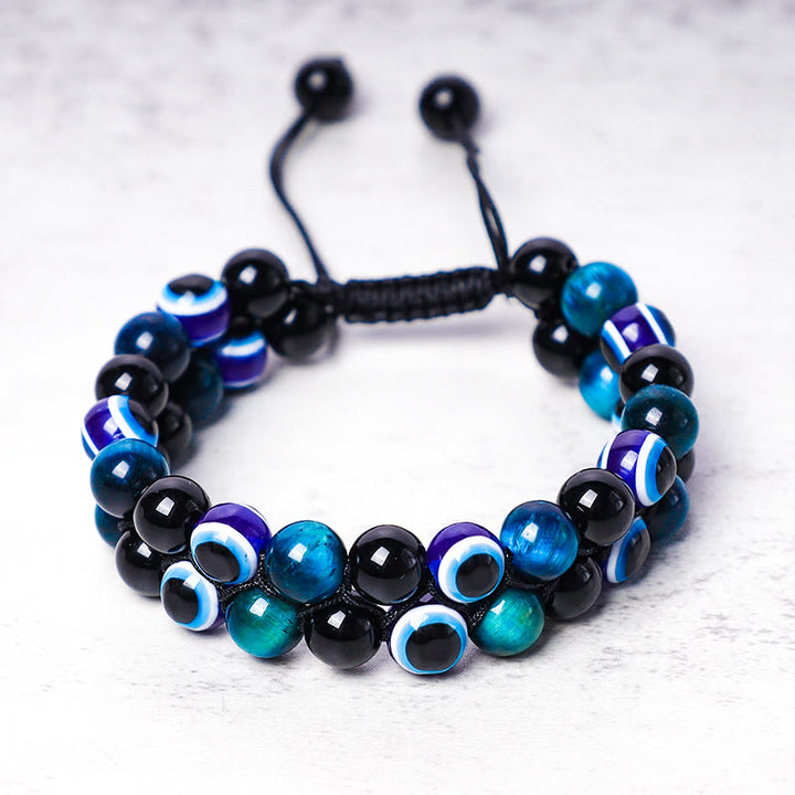 Bracelet de perles de protection contre le mauvais œil en hématite et œil de tigre Buddha Stones