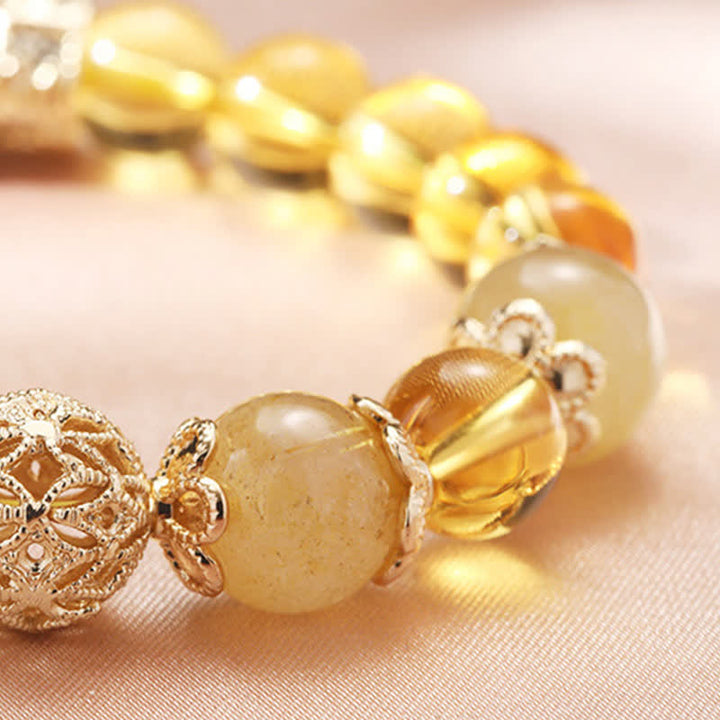 Bracelet de perles de prospérité et de générosité en Buddha Stones et citrine