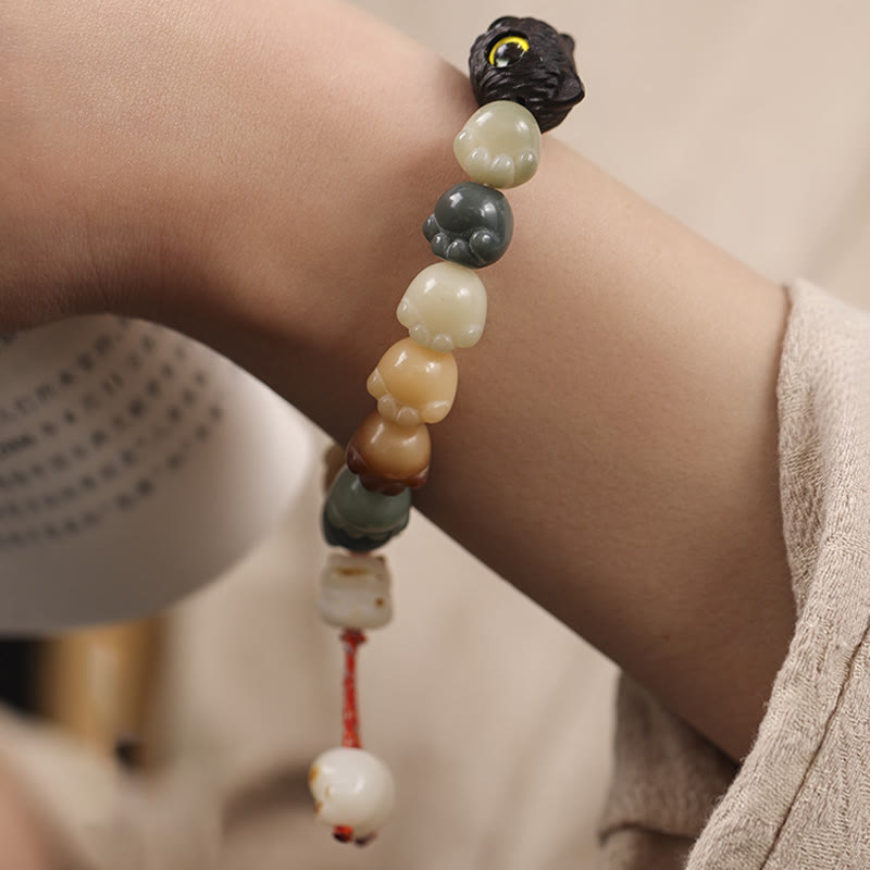 Bracelet de sagesse porte-bonheur en bois d'ébène avec de belles pattes et des graines de Bodhi naturelles de Buddha Stones - image 12
