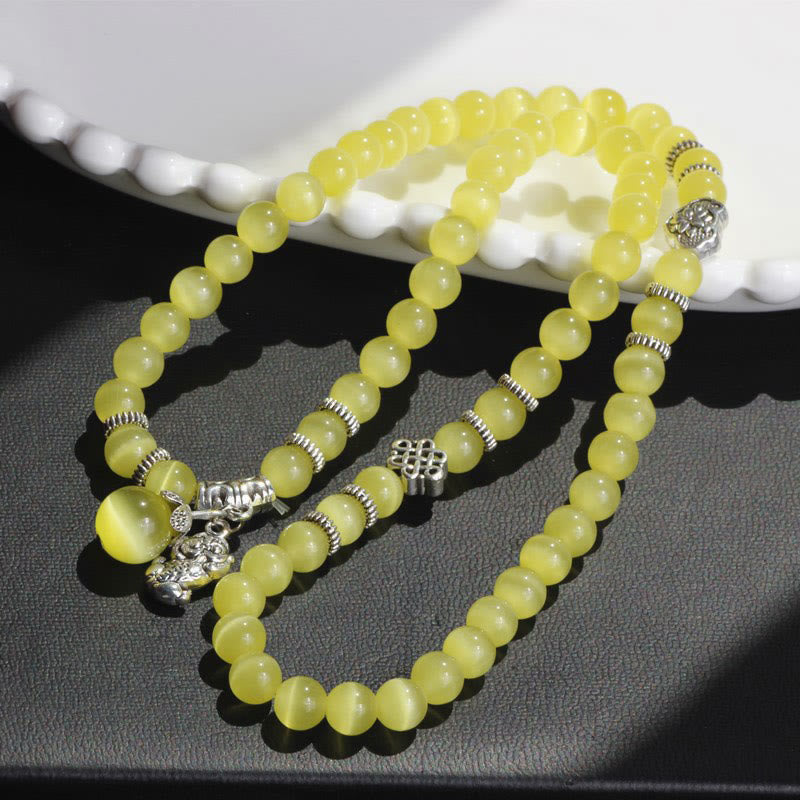 Bracelet triple tour de soutien PiXiu œil de chat en Buddha Stones