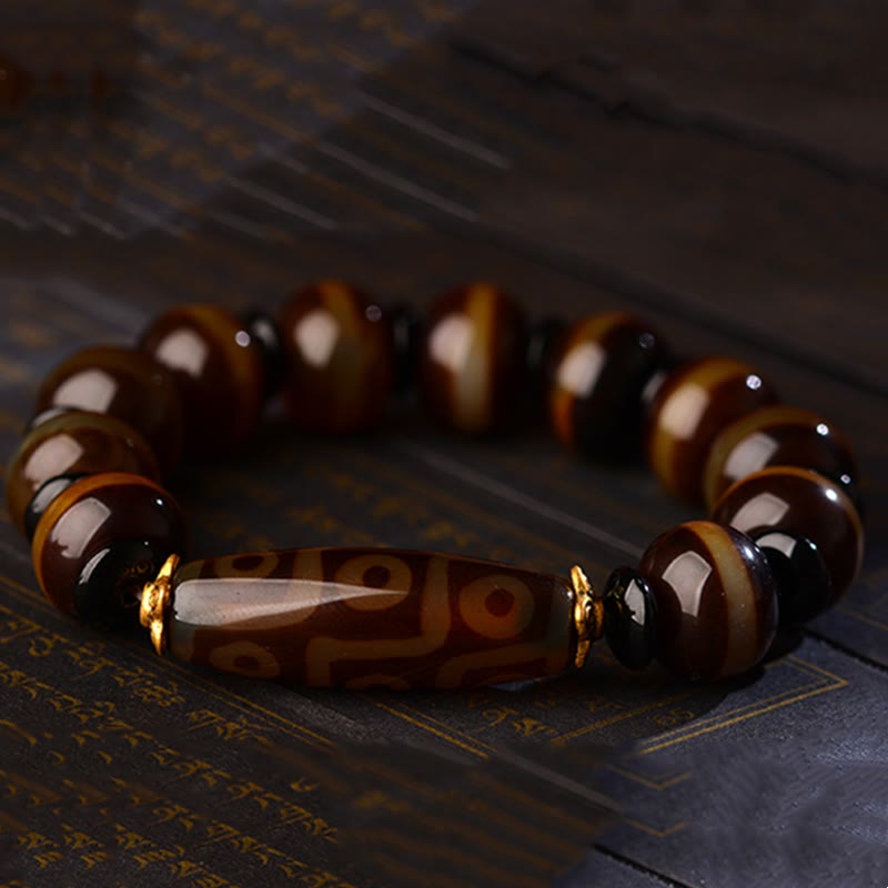 Bracelet tibétain en agate naturelle à neuf yeux avec perles dzi et Buddha Stones