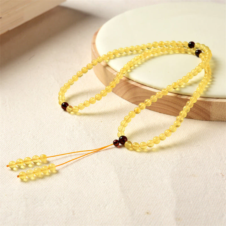 Bracelet Mala Buddha Stones 108 perles en ambre naturel transparent pour l'anxiété