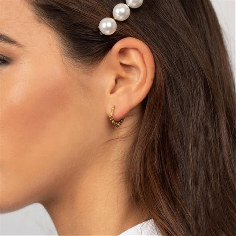 Boucles d'oreilles créoles porte-bonheur à motif de fleur de lotus ronde
