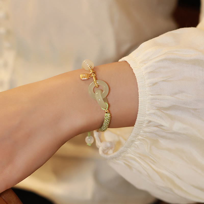 Bracelet tressé en perles de jade Hetian naturelles de Buddha Stones avec boucle de paix double et caractère Fu