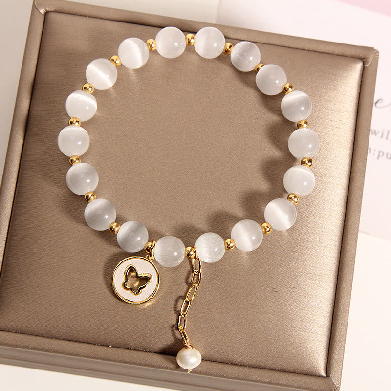 Bracelet d'amour avec breloque papillon œil de chat et Buddha Stones