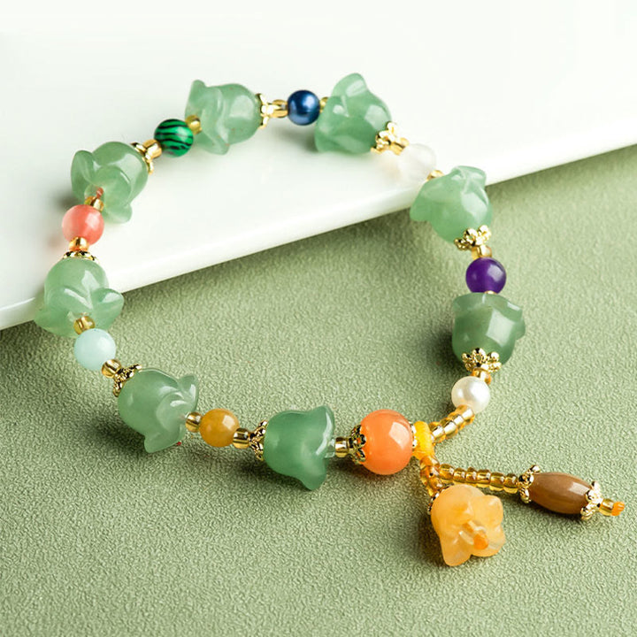 Bracelet porte-bonheur en aventurine verte et fleur de magnolia de Buddha Stones