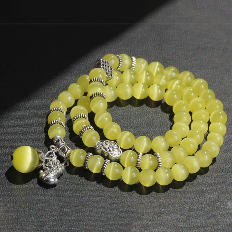 Bracelet triple tour de soutien PiXiu œil de chat en Buddha Stones