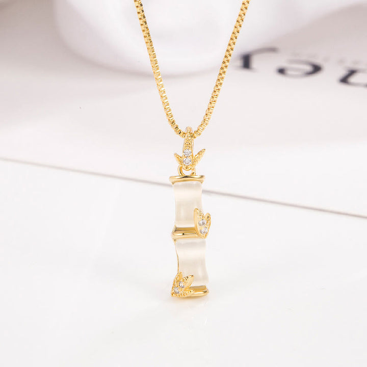 Collier pendentif harmonieux en calcédoine et bambou avec Buddha Stones