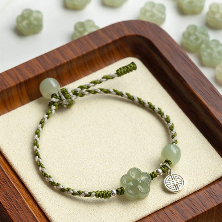 Bracelet tressé en jade fait main avec des Buddha Stones et des fleurs de prunier