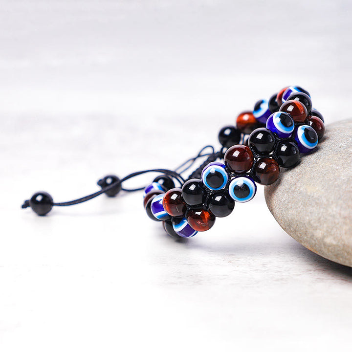 Bracelet de perles de protection contre le mauvais œil en hématite et œil de tigre Buddha Stones