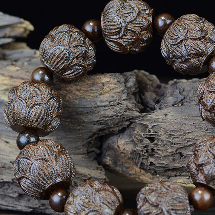 Bracelet d'équilibre gravé en bois d'ébène avec Buddha Stones et dragon de lotus des dix-huit arhats