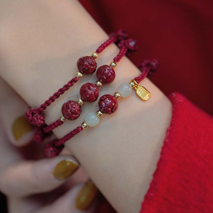 Bracelet tissé en fil rouge calme avec Buddha Stones, jade cinabre et lotus
