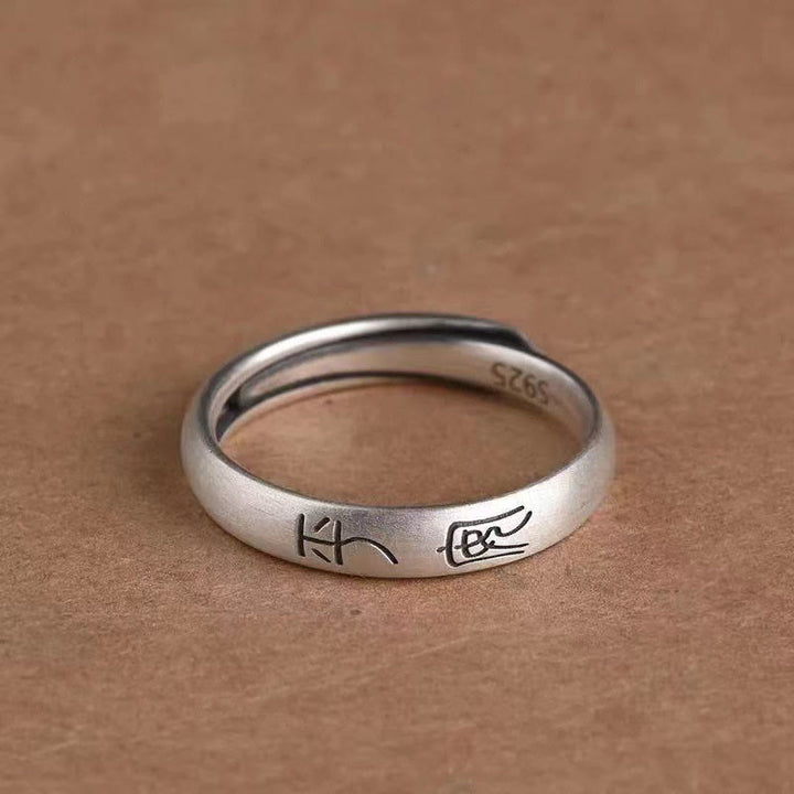 Bague de richesse en cuivre avec paix et joie
