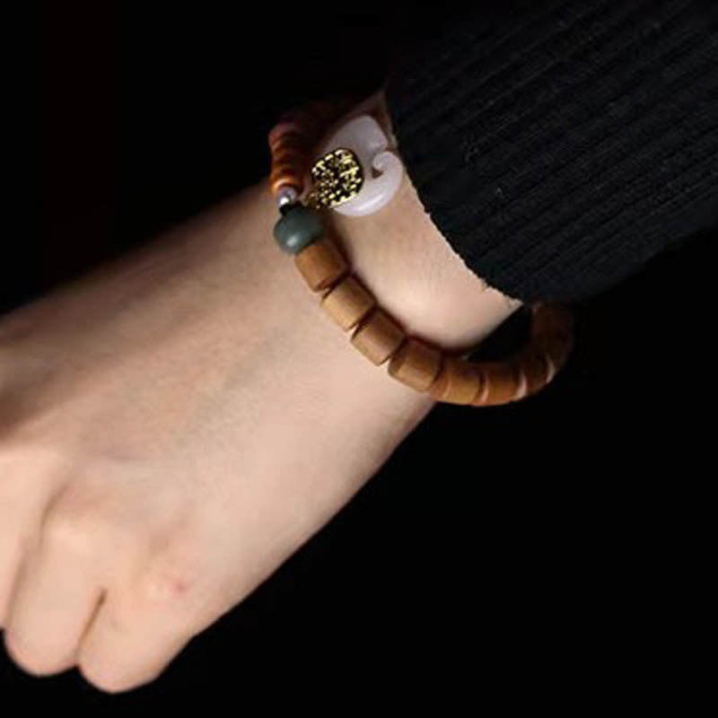 Bracelet de protection éléphant en jade et bois de santal