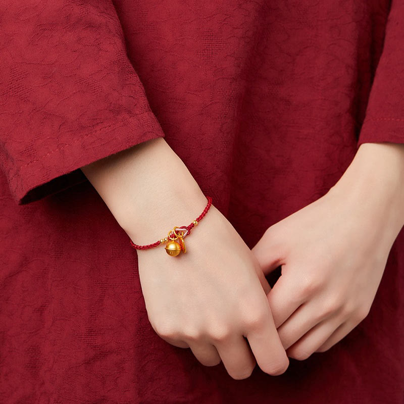 Bracelet en corde rouge avec breloque en forme de personnage Fu fait à la main en Buddha Stones