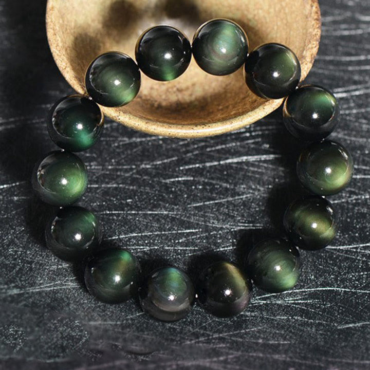 Bracelet de richesse en obsidienne naturelle œil vert Buddha Stones