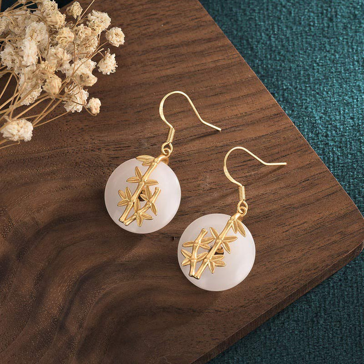 Boucles d'oreilles porte-bonheur en jade blanc Feng Shui Buddha Stones