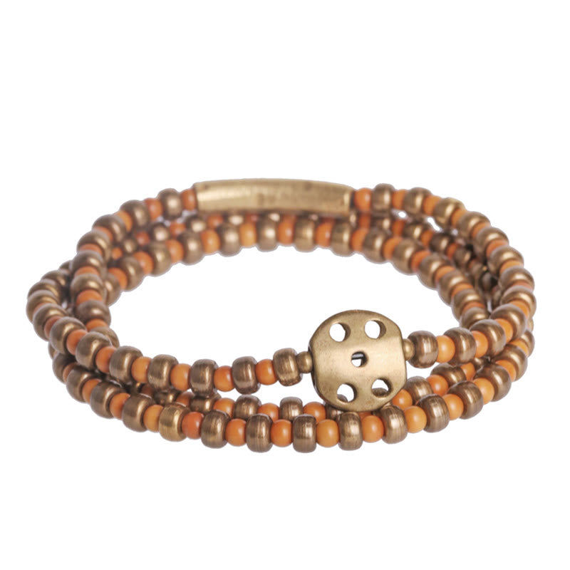 Bracelet de richesse rétro en cuivre avec noyau d'olive et Buddha Stones