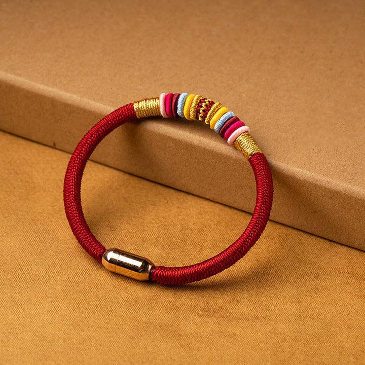 Bracelet tressé à boucle magnétique en Buddha Stones tibétaines fait à la main avec protection des nœuds King Kong